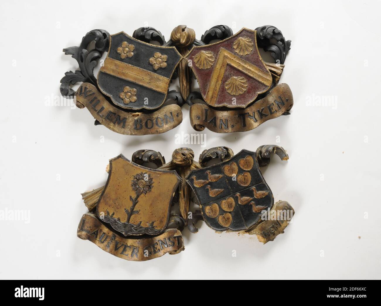 Anonymous, Two carved two-by-two coats of arms of the regents of the H. Geest Orphanage, namely Laurens Vergenst and Clemens van Swanenburg ,, Dating from the first half of the 18th century Stock Photo