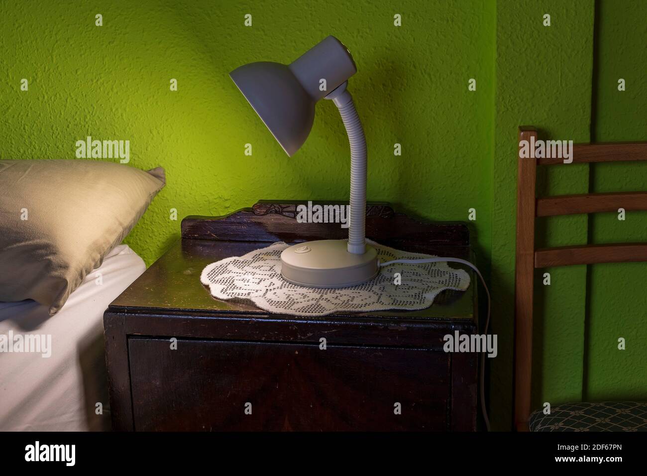 Old bedside table with lamp. Pinto. Madrid. Spain. Europe. Stock Photo
