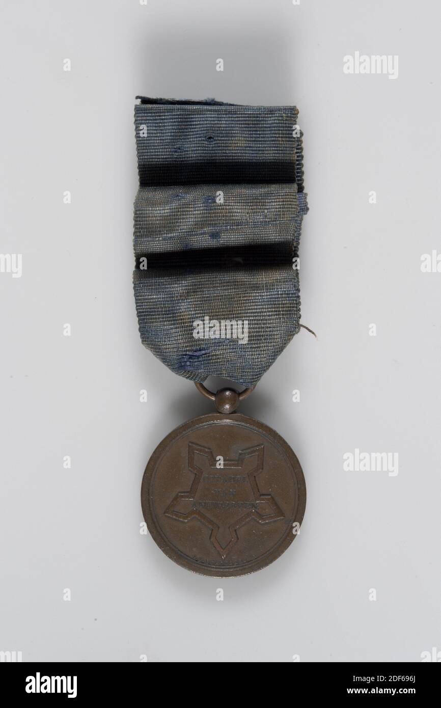 medal, 1832, cast, General: 4.4 x 3 x 0.3cm 44 x 30 x 3mm, Medal diameter: 3cm 30mm, Weight: 17.2g, Bronze Antwerp Medal or Citadel Medal 1832, worn by J. van Leeuwen. On the front is a citadel depicted with CITADEL VAN ANTWERPEN inside. The signature is below. On the back is a crowned letter W with DECEMBER 1832. It served as a reward to those who served in the citadel during the siege of Antwerp 1832, 1884 Stock Photo