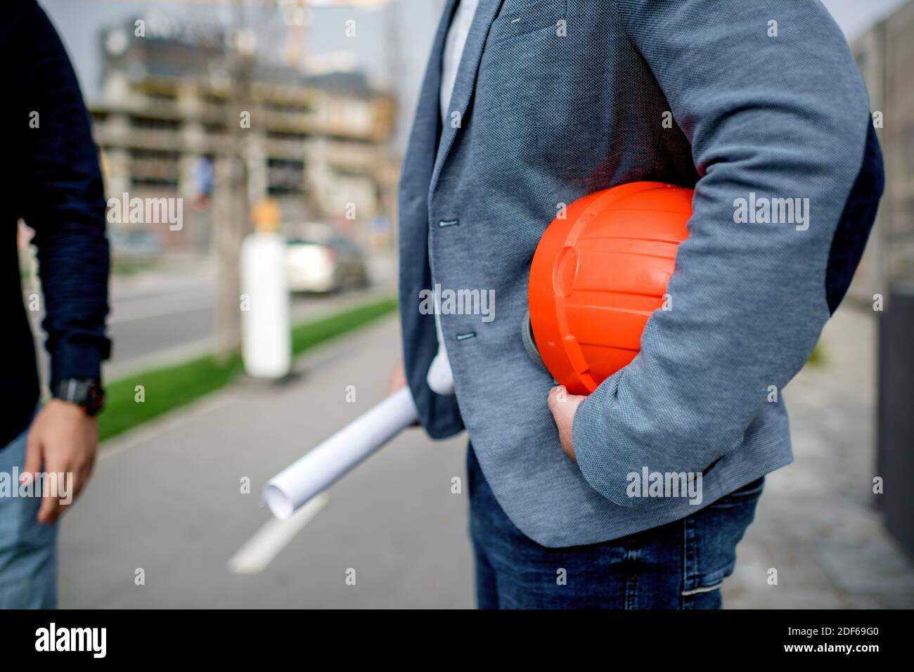 Two architects having work meeting at construction site Stock Photo