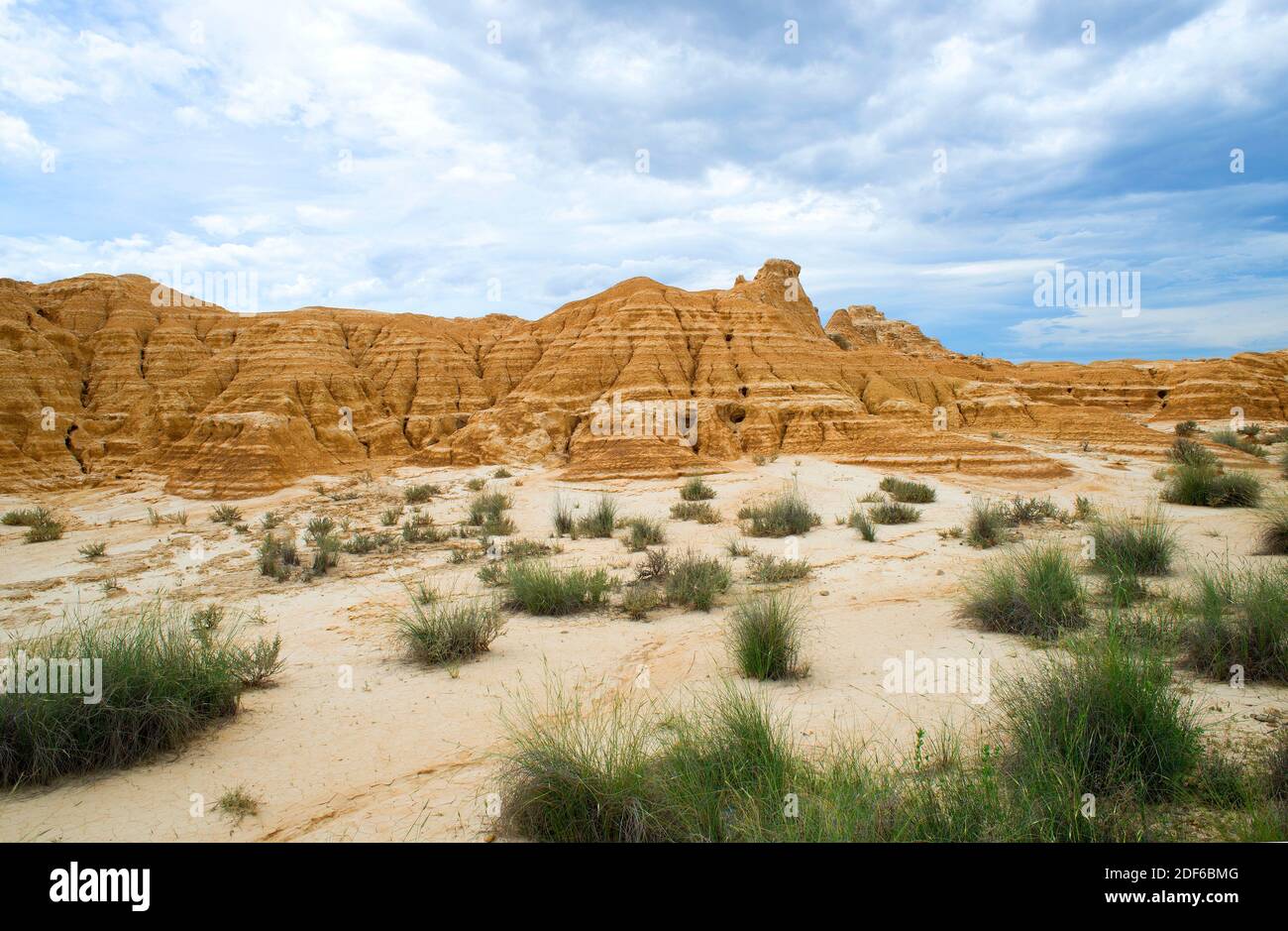 Badlands are a dry terrains formed with softer sedimentary rocks (clay), easy to erode by water or wind. This photo was taken in Bardenas Reales, Stock Photo