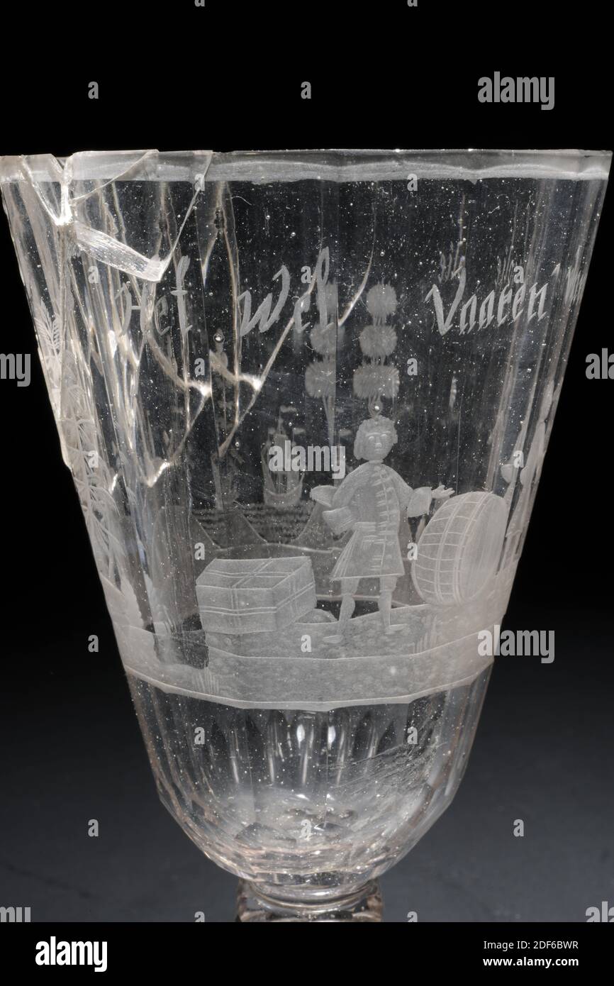 glass jar, first half of the 18th century, General: 18.1 x 9.4 cm, 181 x 94 mm, village view, man, sailing ship, jar of colorless glass. Foot elevated in the middle with alternating ovals and stripes on the underside. Flared octagonal stem with foot ring and pentagon-covered button. Faceted chalice engraved with the representation of three standing men in costume. One is between a chest and a large barrel, the other two are talking to each other. They are located on a hilly terrain with a group of houses and a tower, trees and water with a sailing ship. Above the men an inscription: The Wel Stock Photo