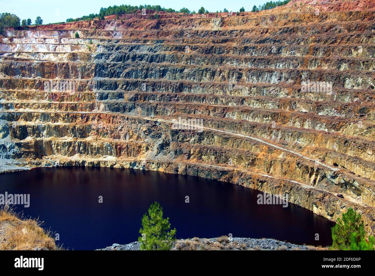 Riotinto mines. Corta Atalaya is a open-pit mine, surface mining technique of minerals extraction. Riotinto is a minerals deposit of chalcopyrite and Stock Photo
