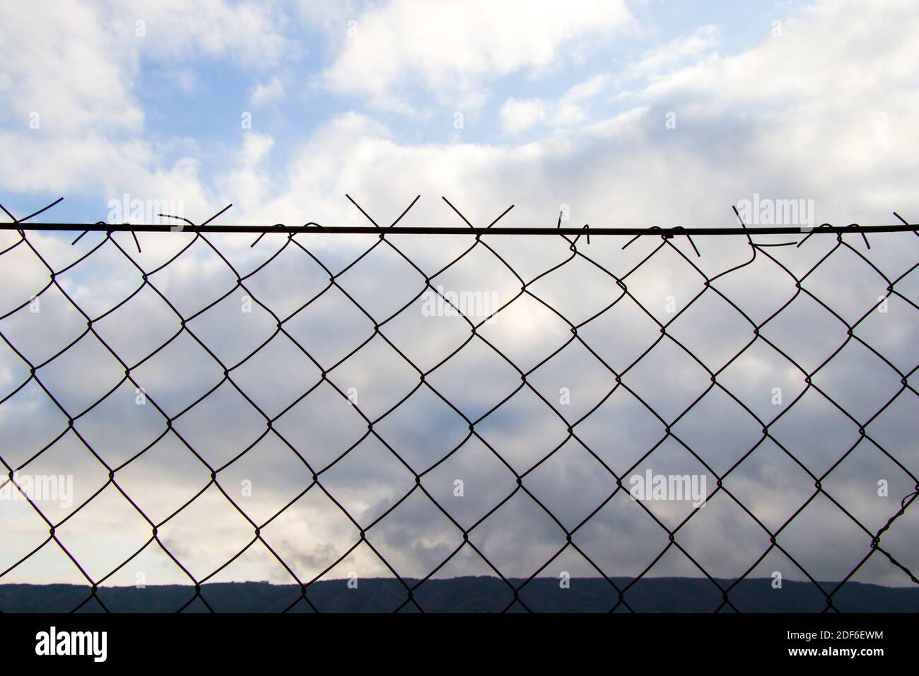 Metal fence background, real fence close-up and texture on the white