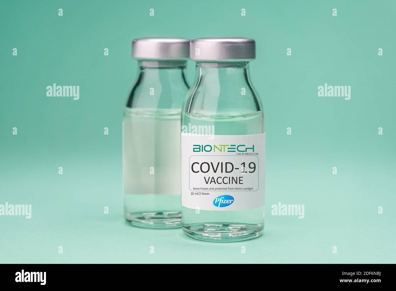 Izmir, Turkey - November 18 2020: Coronavirus vaccine concept and background. New vaccine pfizer and biontech isolated on blue background. Covid-19, 2 Stock Photo