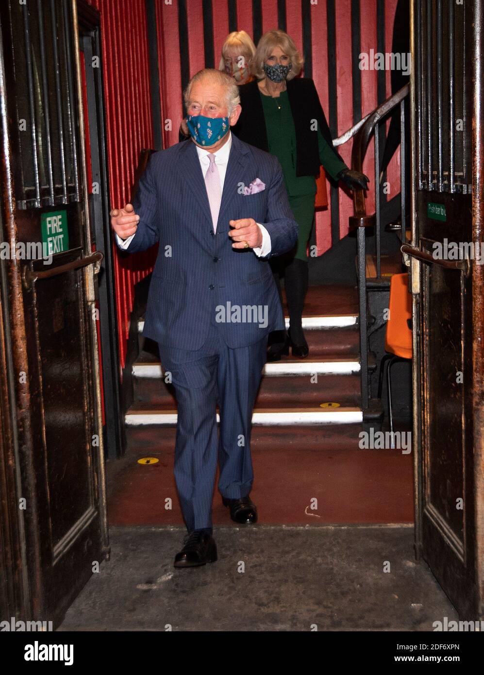 The Prince of Wales and Duchess of Cornwall during a visit to the 100 Club nightclub in London. Stock Photo