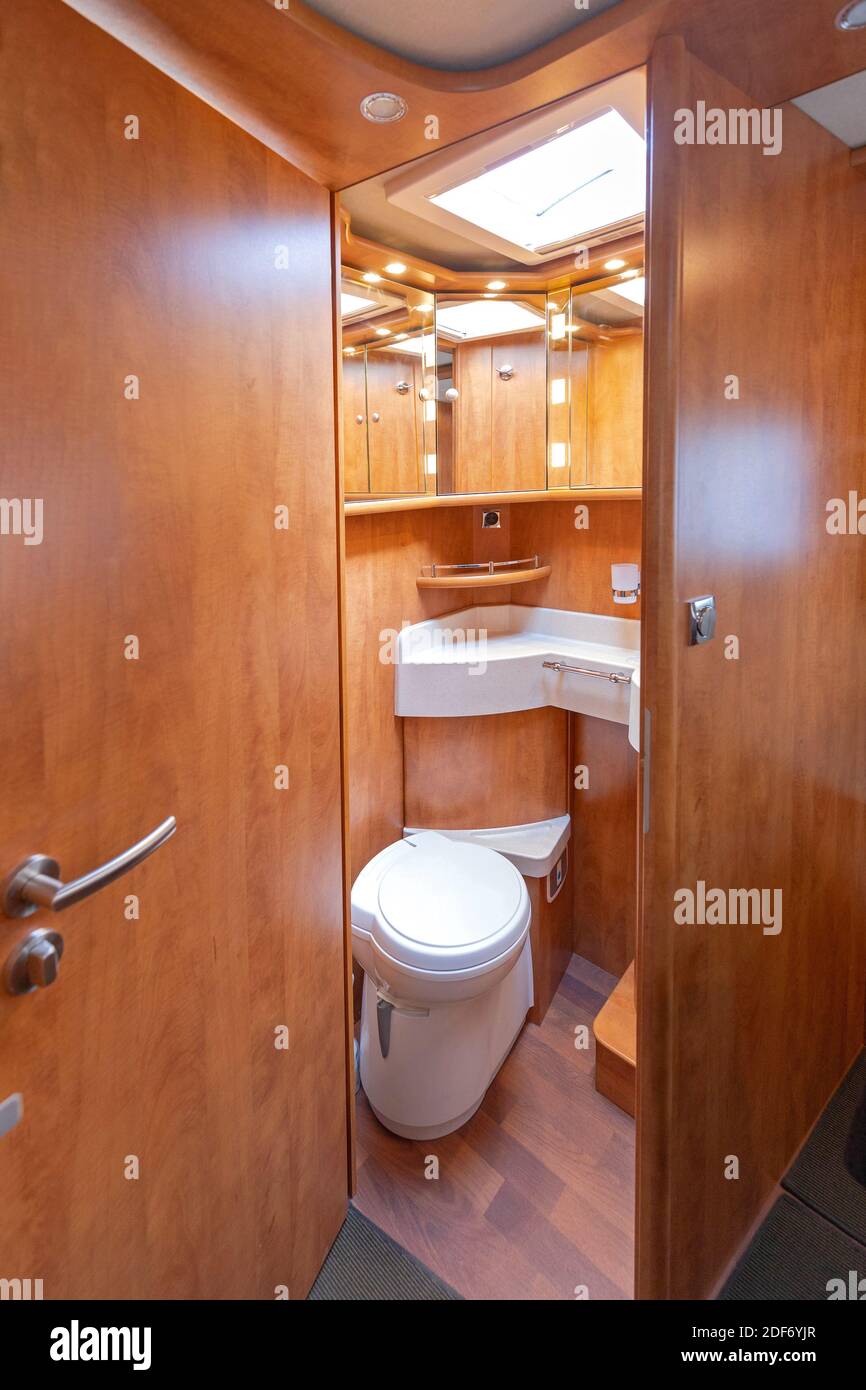 Chemical Cassette Toilet With Skylight Window Wooden Camper Van Stock