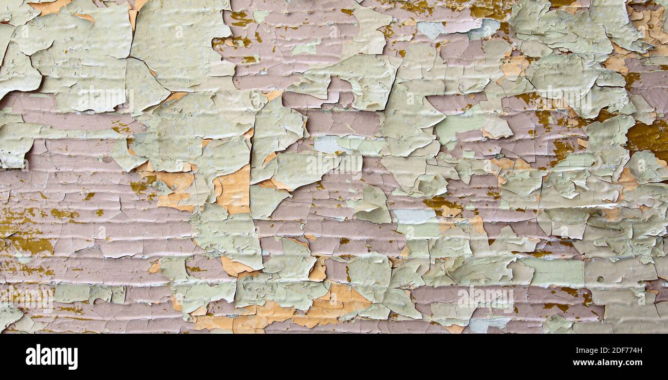 Cracks in the old plaster - grunge texture Stock Photo