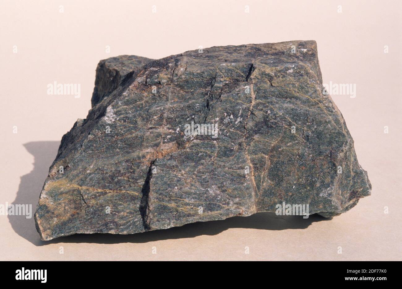 Amphibolite is a metamorphic rock mainly composed by amphibole minerals. Sample. Stock Photo