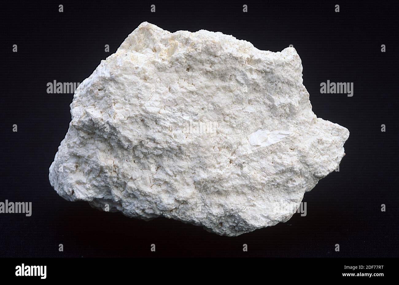 Chalk is a kind of limestone porous and white, composed of calcite. Sample. Stock Photo