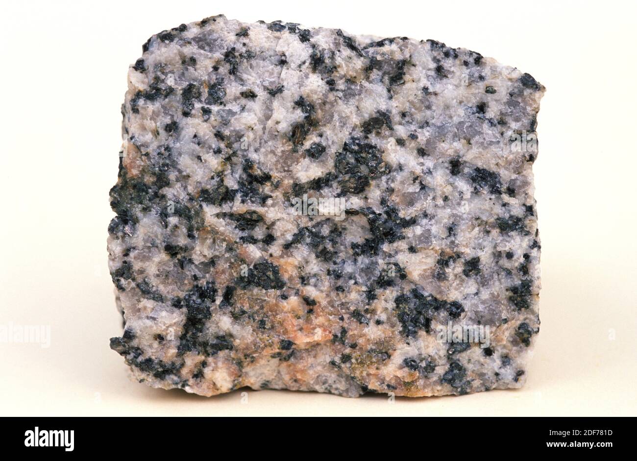 Granite is an igneous intrusive rock with holocrystalline texture. Sample. Stock Photo