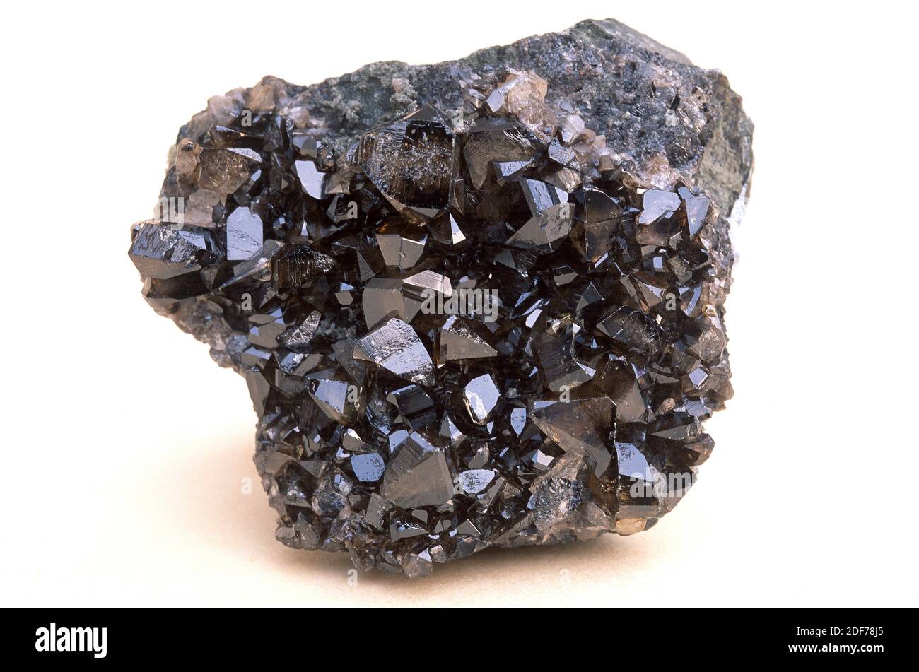 Cassiterite is a tin oxide mineral. Crystallized sample. Stock Photo