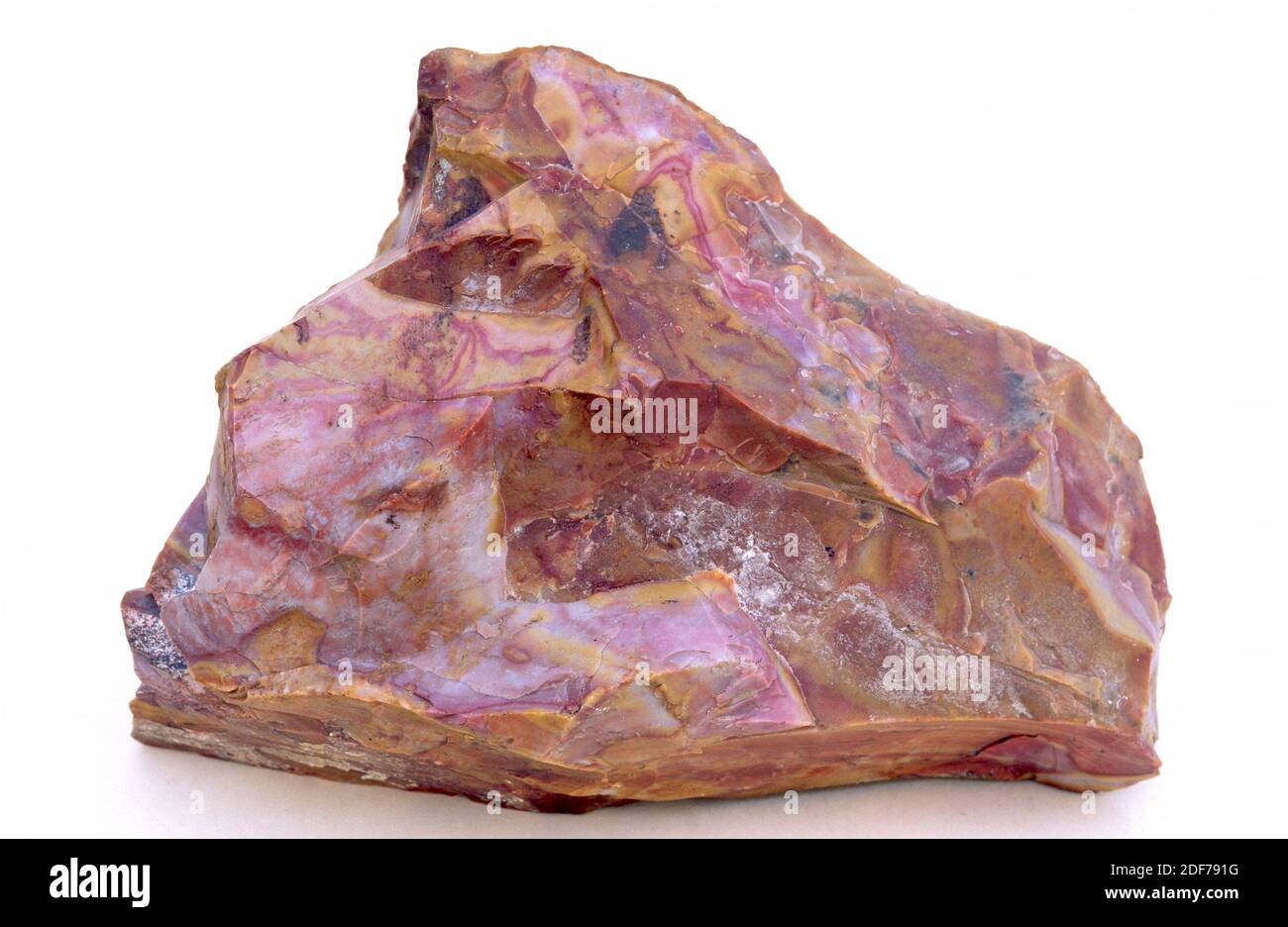 Jasper is an aggregate of microparticles of quartz. Sample. Stock Photo