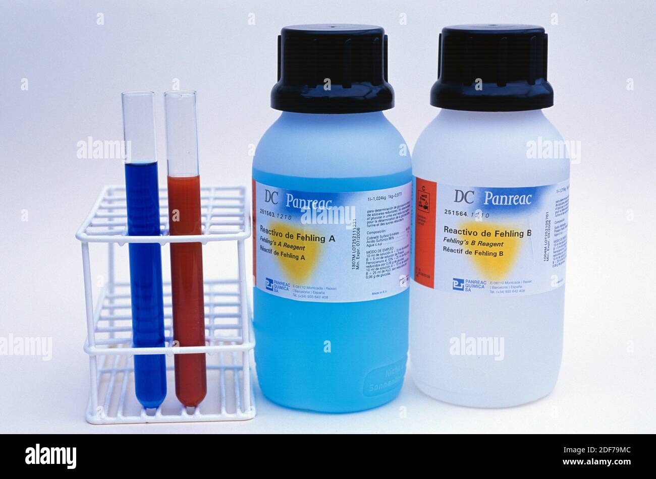 Fehling's solution is a reagent used to recognized reducing sugars. At left negative, at right positive. Stock Photo