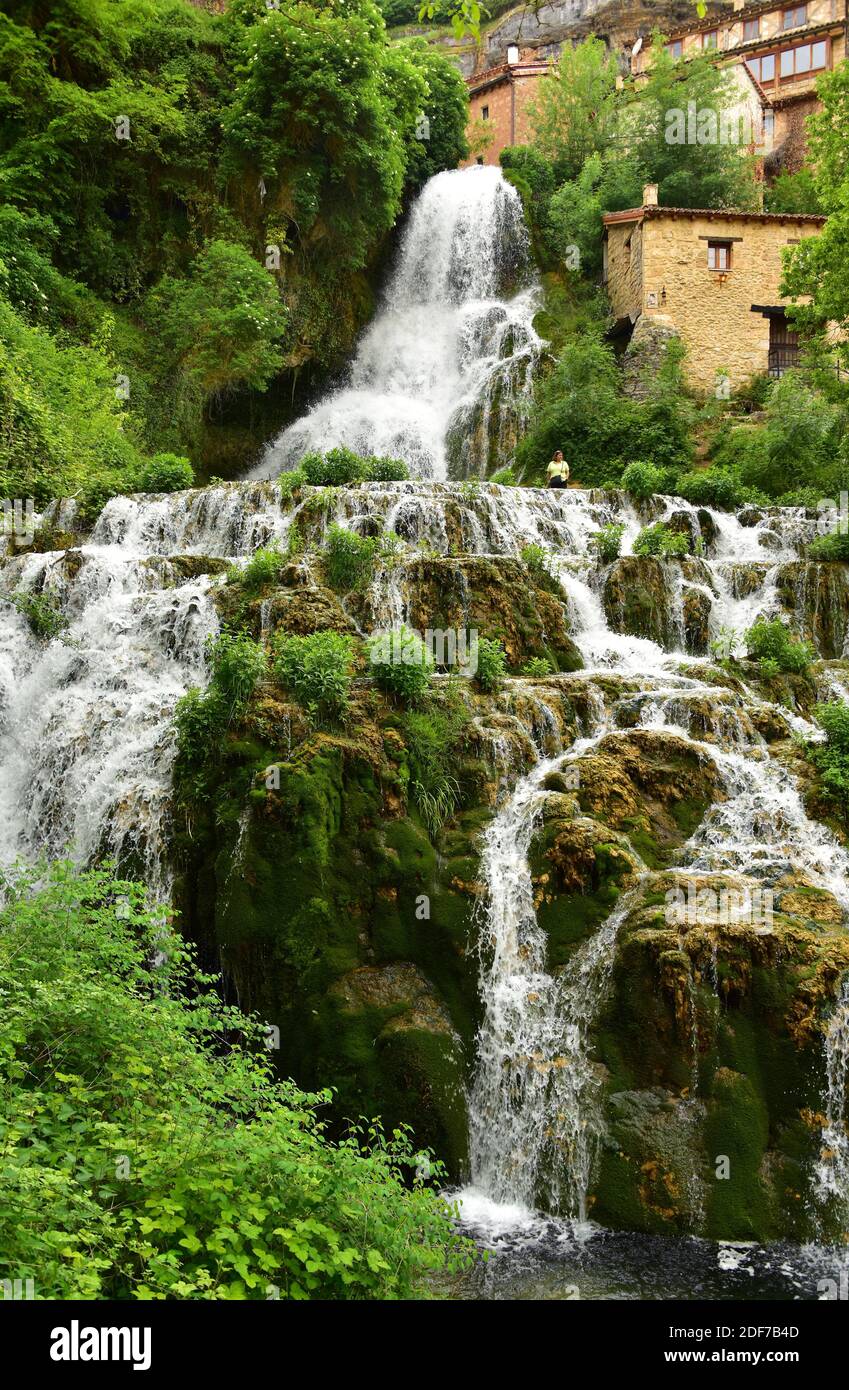 Orbaneja del Castillo, houses and waterfall. Burgos province, Castilla y Leon, Spain. Stock Photo