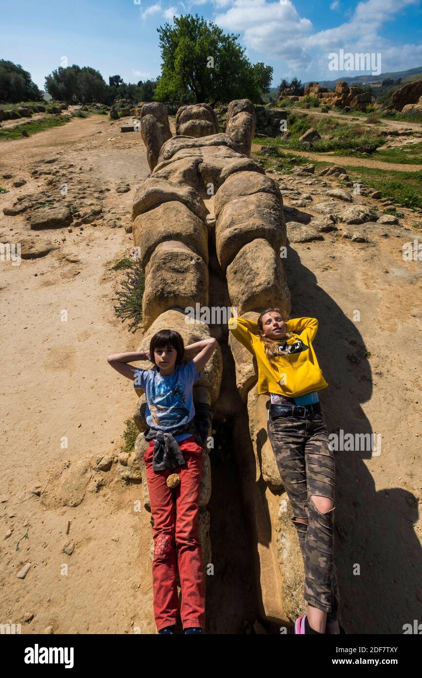 Italy, Sicily, Agrigento, Valley of the Temples, with the giant stone guardians, called Telamon or Atlantis on the esplanade e l'Olympi?ion Stock Photo