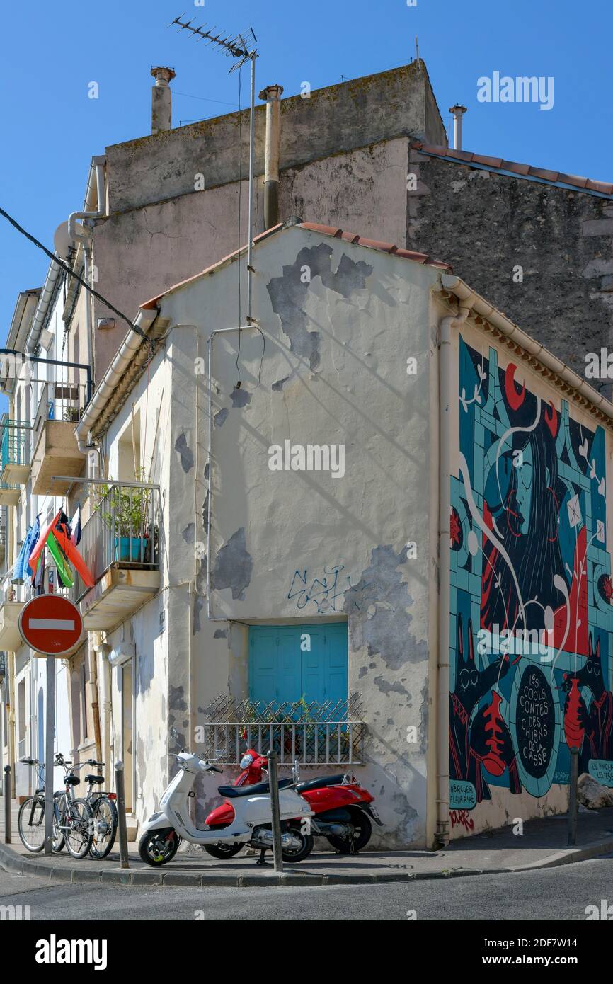 France, Herault, Sete, Quartier Haut, Villaret Joyeuse street, fresco  painted on a wall with a scooter in the foreground Stock Photo - Alamy