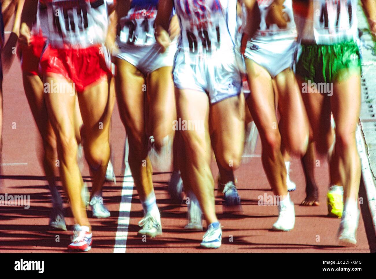 Detail of women runners legs competing in a race Stock Photo Alamy