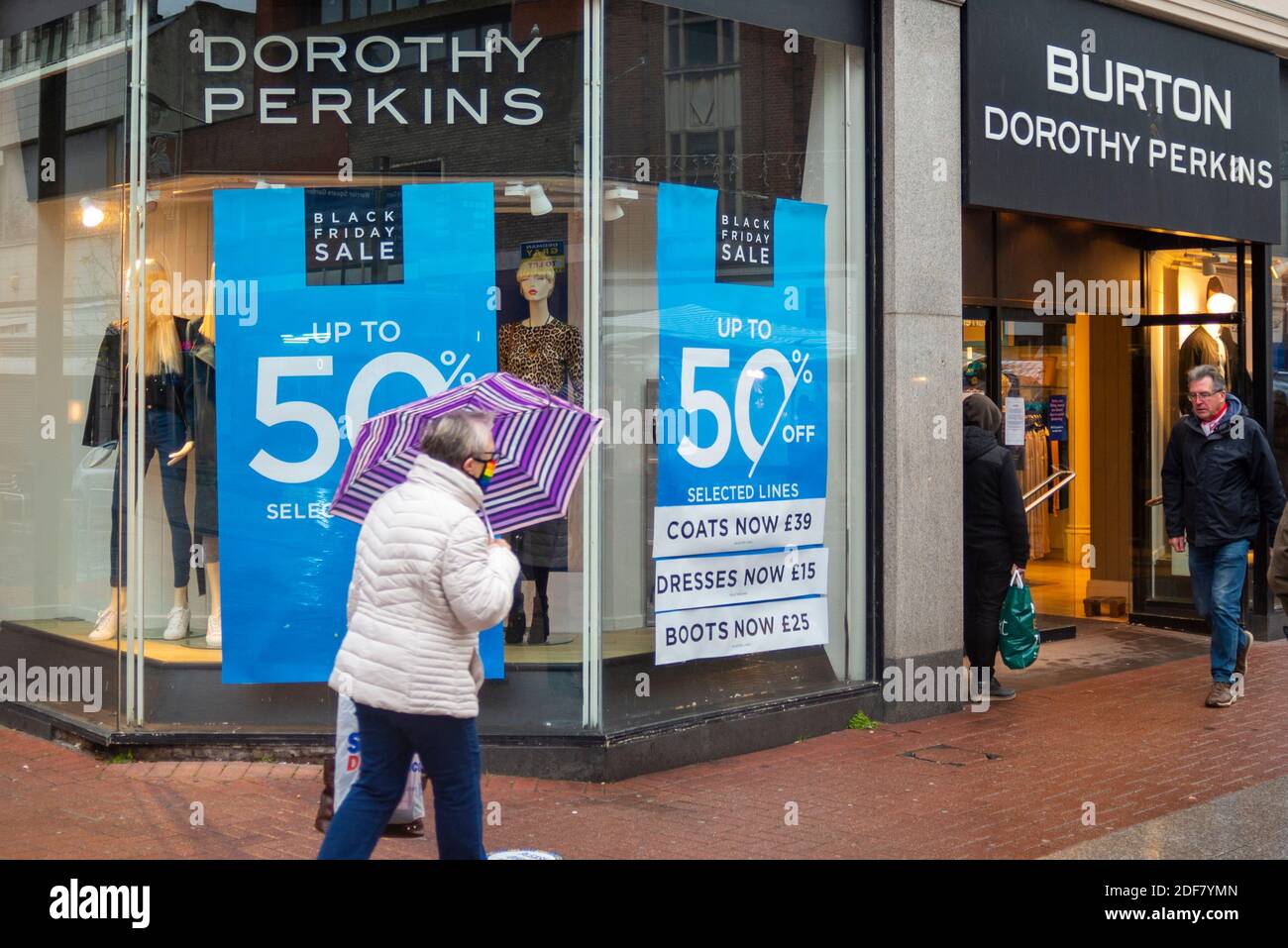 Arcadia Group, Burton, Dorothy Perkins fashion shop in High Street,  Southend on Sea, Essex, UK. Half price black Friday sale sign in window.  Person Stock Photo - Alamy