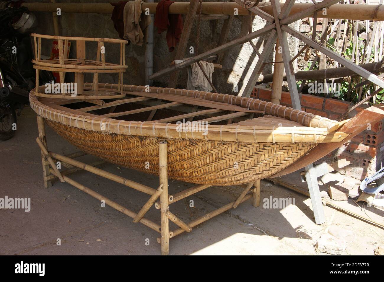 Bamboo woven by skilled craftsmen into boats when waterproofed and sun