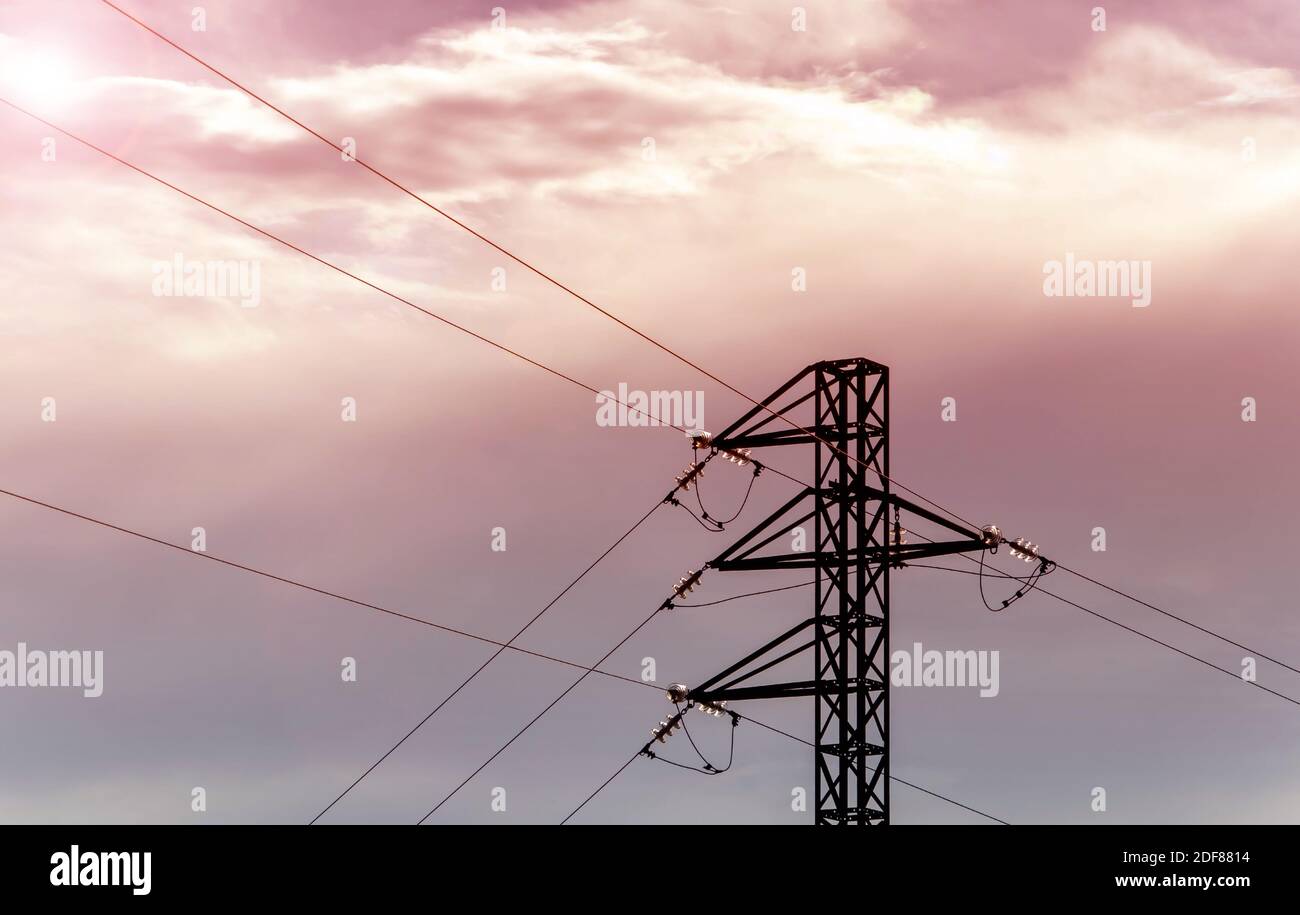 Energy distribution. Power transmission tower. High voltage three phase single circuit overhead electric line. Stock Photo