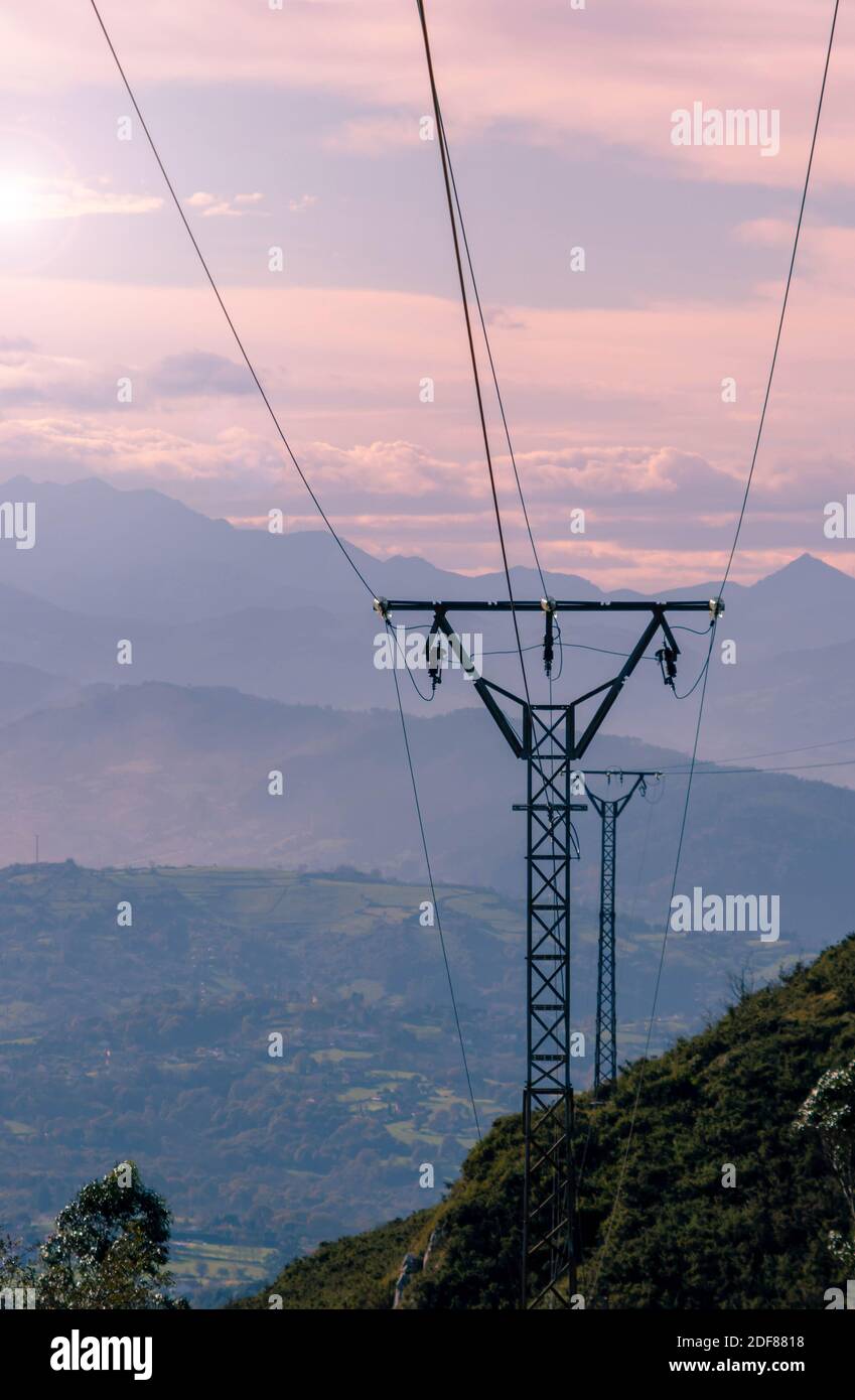 Energy transmission and distribution. Power line towers. High voltage overhead electric line. Stock Photo