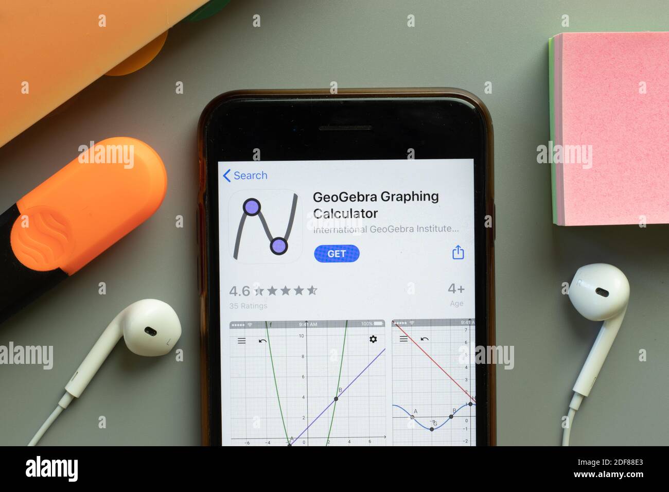 New York, USA - 1 December 2020: GeoGebra Graphing Calculator mobile app icon on phone screen top view, Illustrative Editorial. Stock Photo