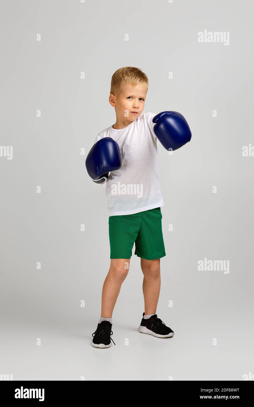 Cute little boy boxing gloves hires stock photography and images Alamy