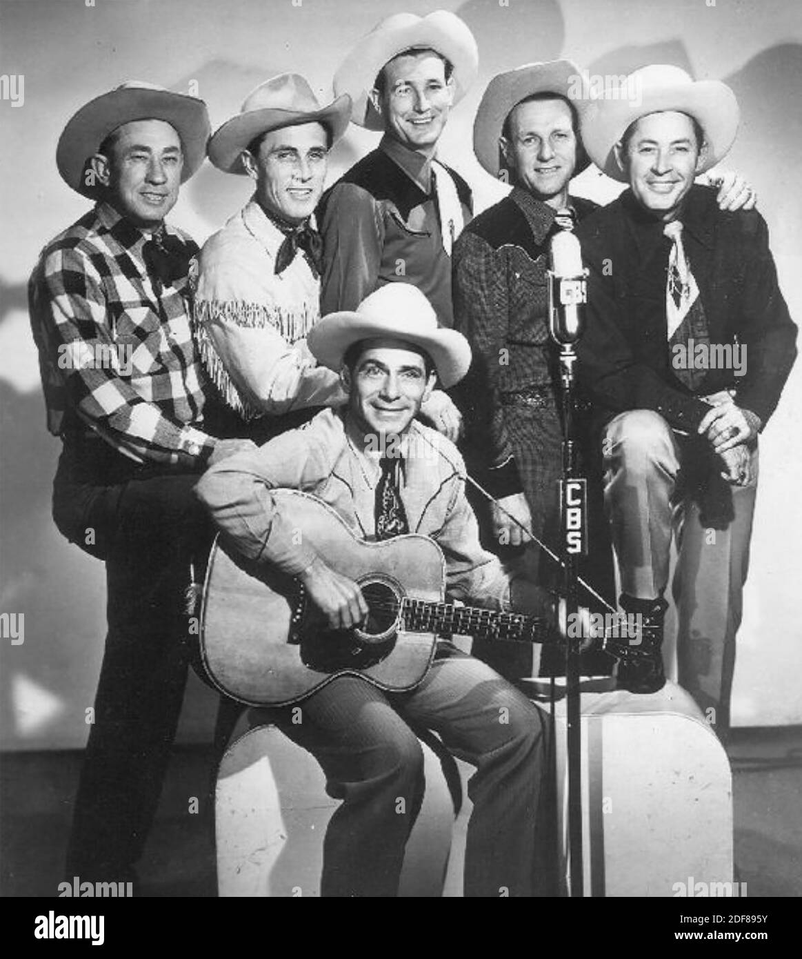 BOB NOLAN and the SONS OF THE PIONEERS Promotional photo of American Country group with Nolan standing in centre about 1949 Stock Photo