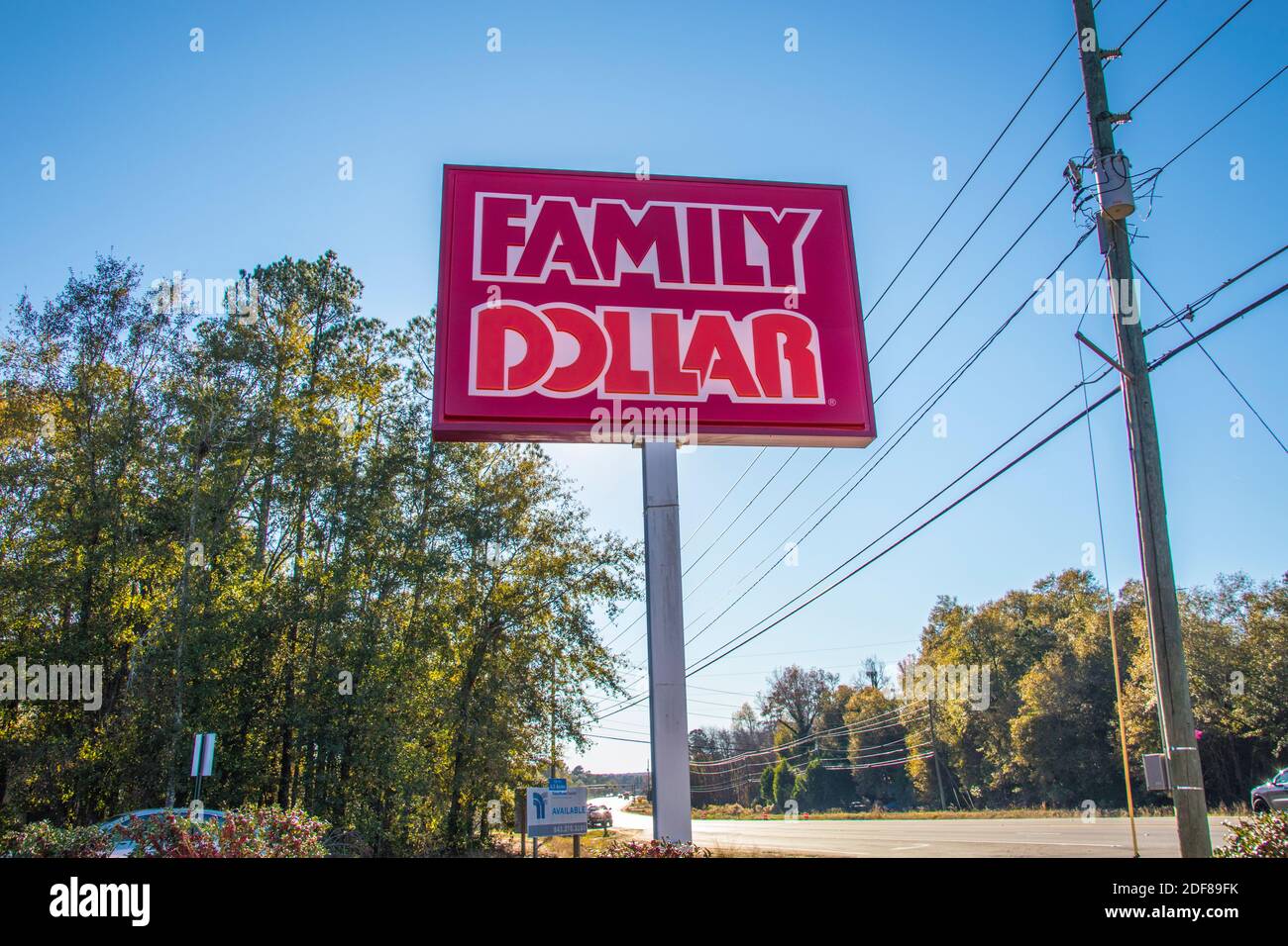 Augusta, Ga USA - 12 02 20: Family Dollar Retail Store street sign and traffic Stock Photo