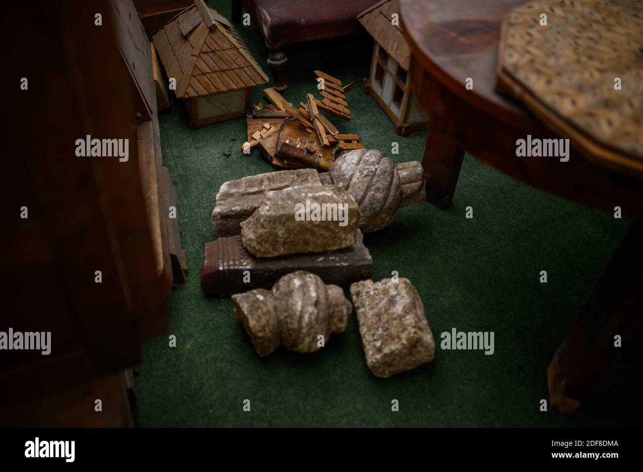 A pile of historical rocks on the floor of an old room Stock Photo - Alamy