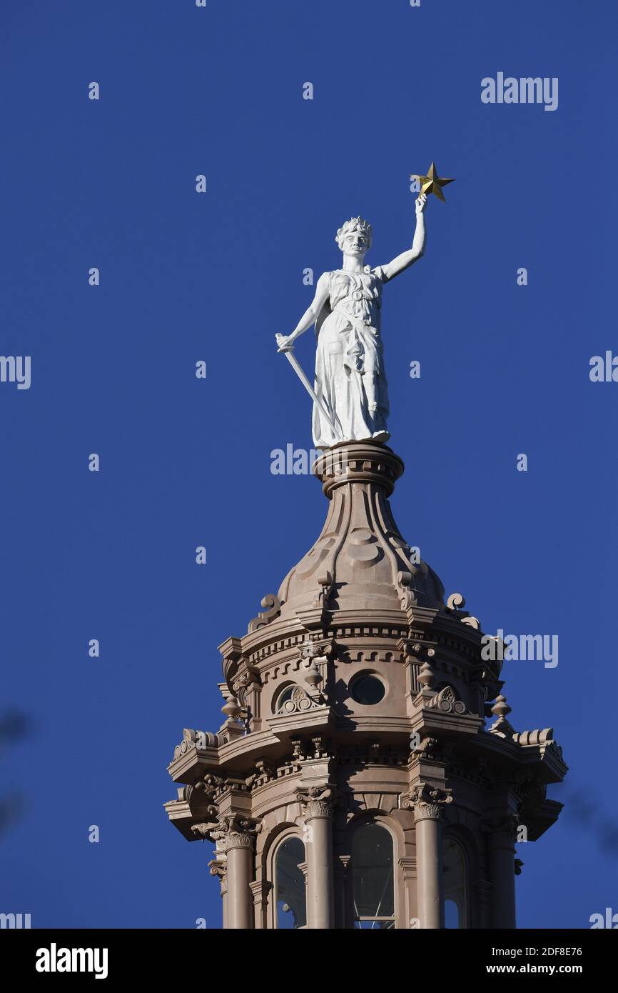The Goddess of Liberty sits atop the Texas Capitol in downtown Austin