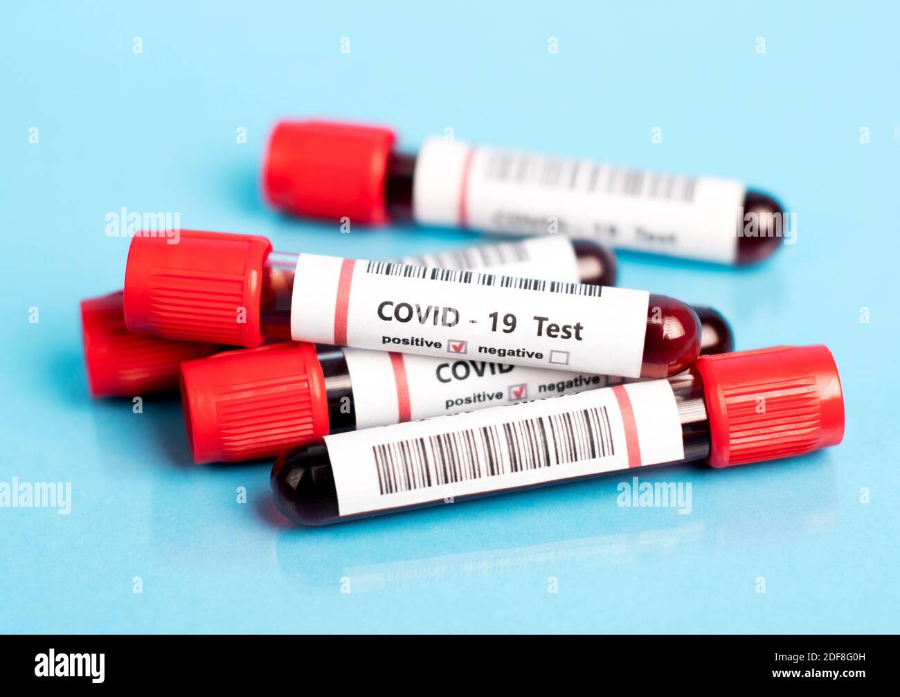 Coronavirus tests blood samples on blue Stock Photo