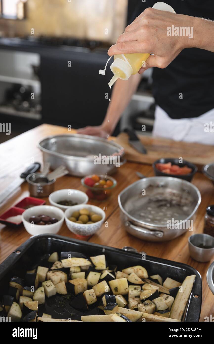 Divserse group of chefs in kitchen Stock Photo