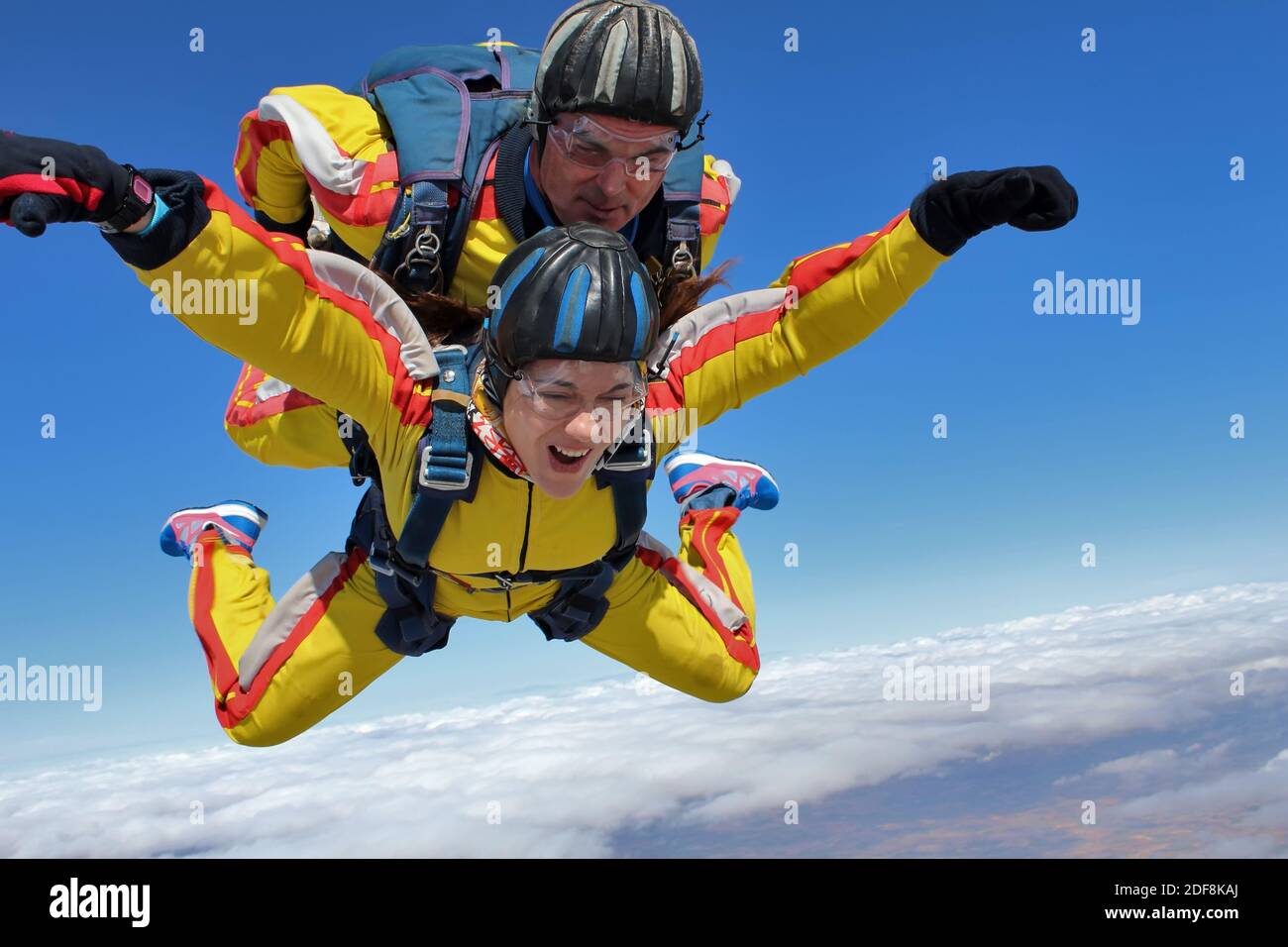 Skydiving tandem yellow suit Stock Photo