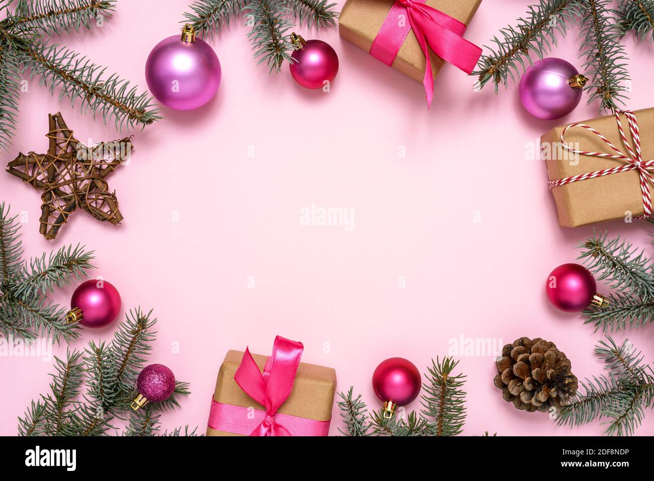 Christmas frame made of fir branches, Christmas ornaments and gift ...