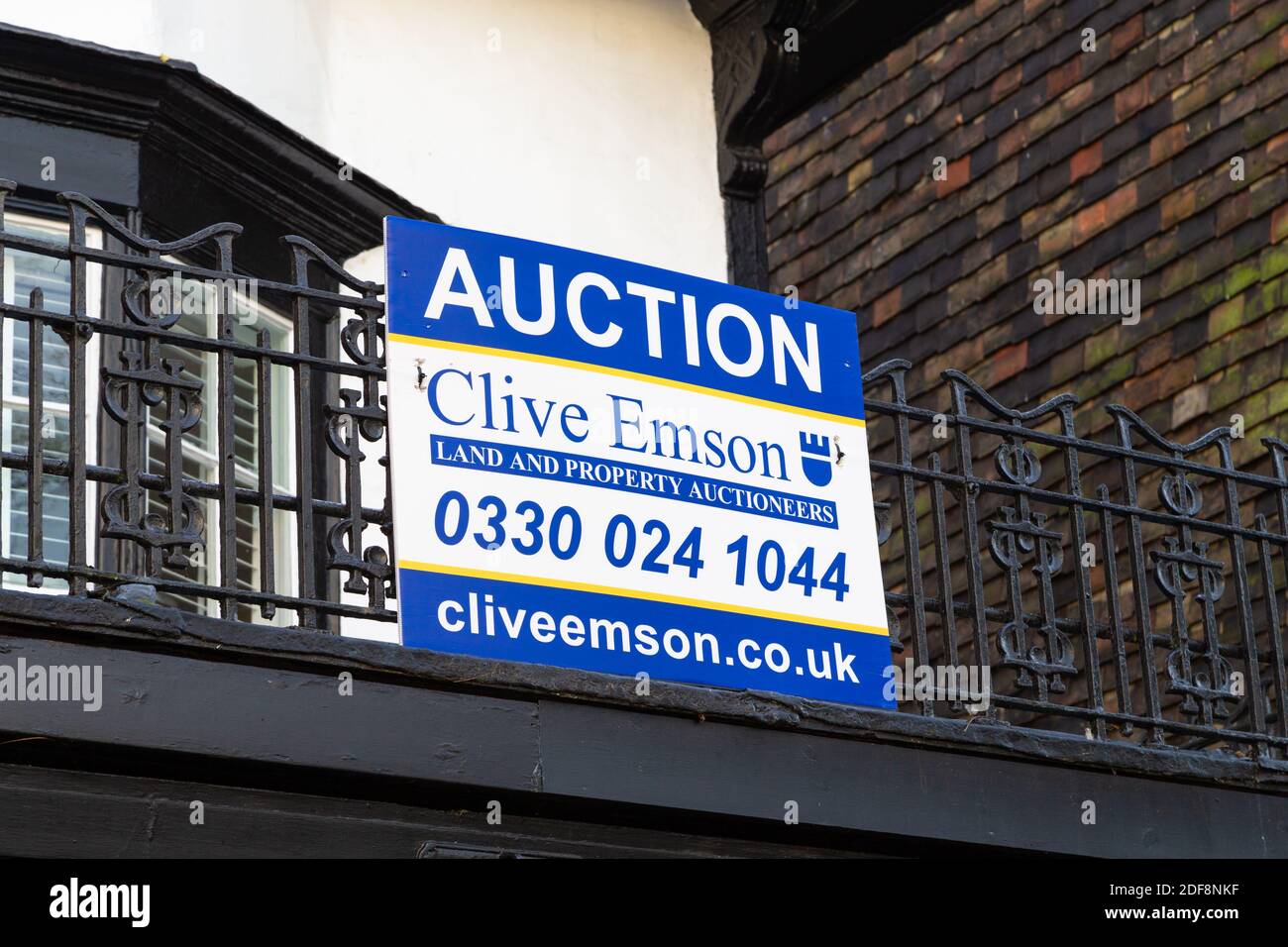Sign for auction house Clive Emson, land and property auctioneers