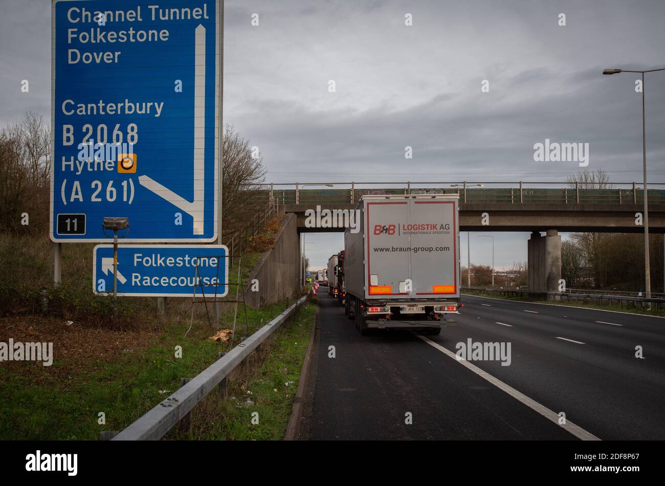 Lorries backlog caused authorities testing post-Brexit checks at the  junction 11 on the M20 as they tried to approach the Eurotunnel . Stock Photo