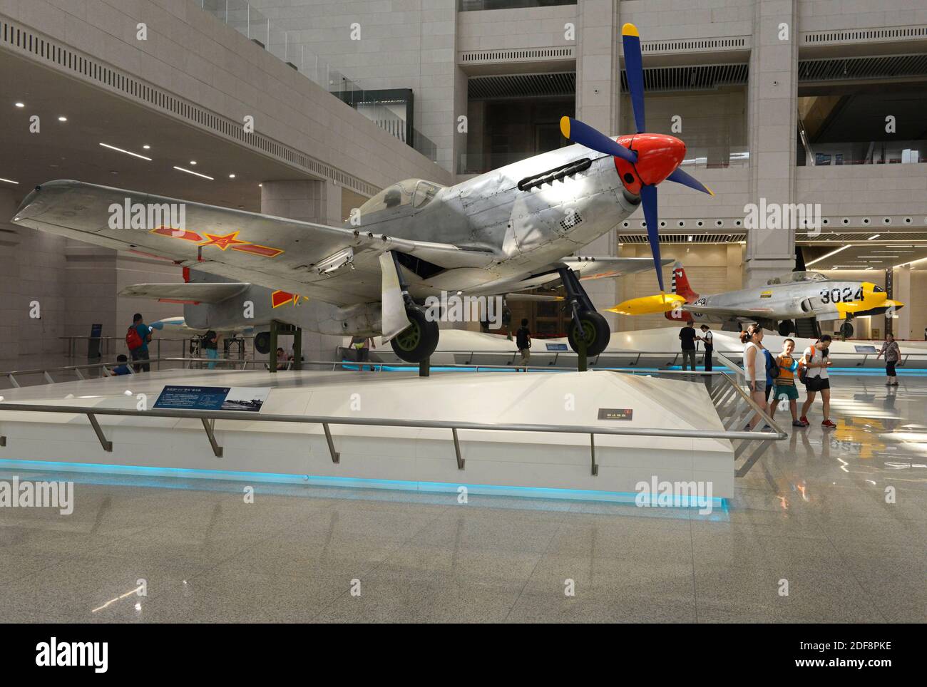 A US P-51 Mustang fighter aircraft in China airforce livery on display in the main hall at the National Military museum in Beijing, China Stock Photo