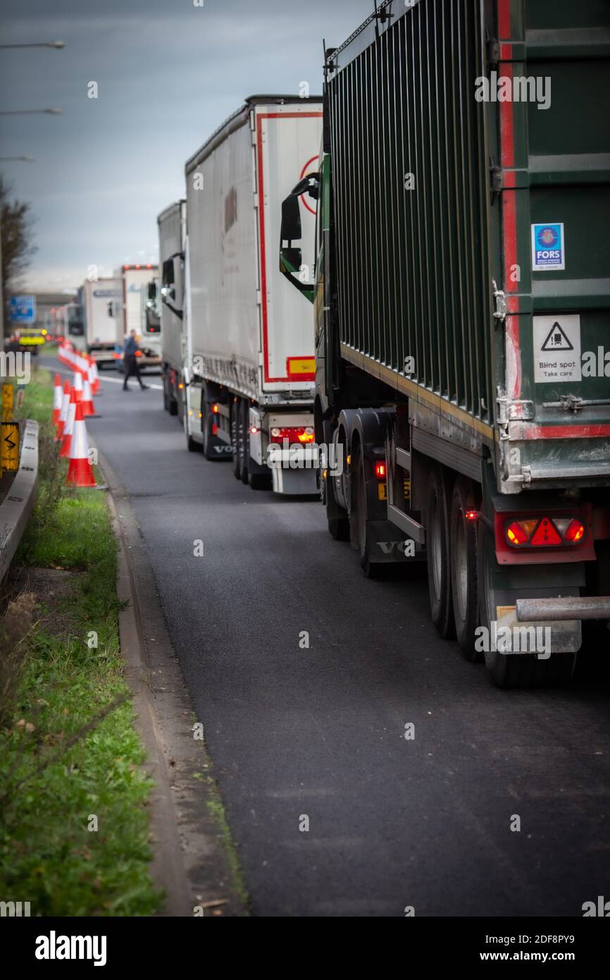 Lorries backlog caused by authorities testing post-Brexit checks at the  junction 11 on the M20 as they tried to approach the Eurotunnel . Stock Photo