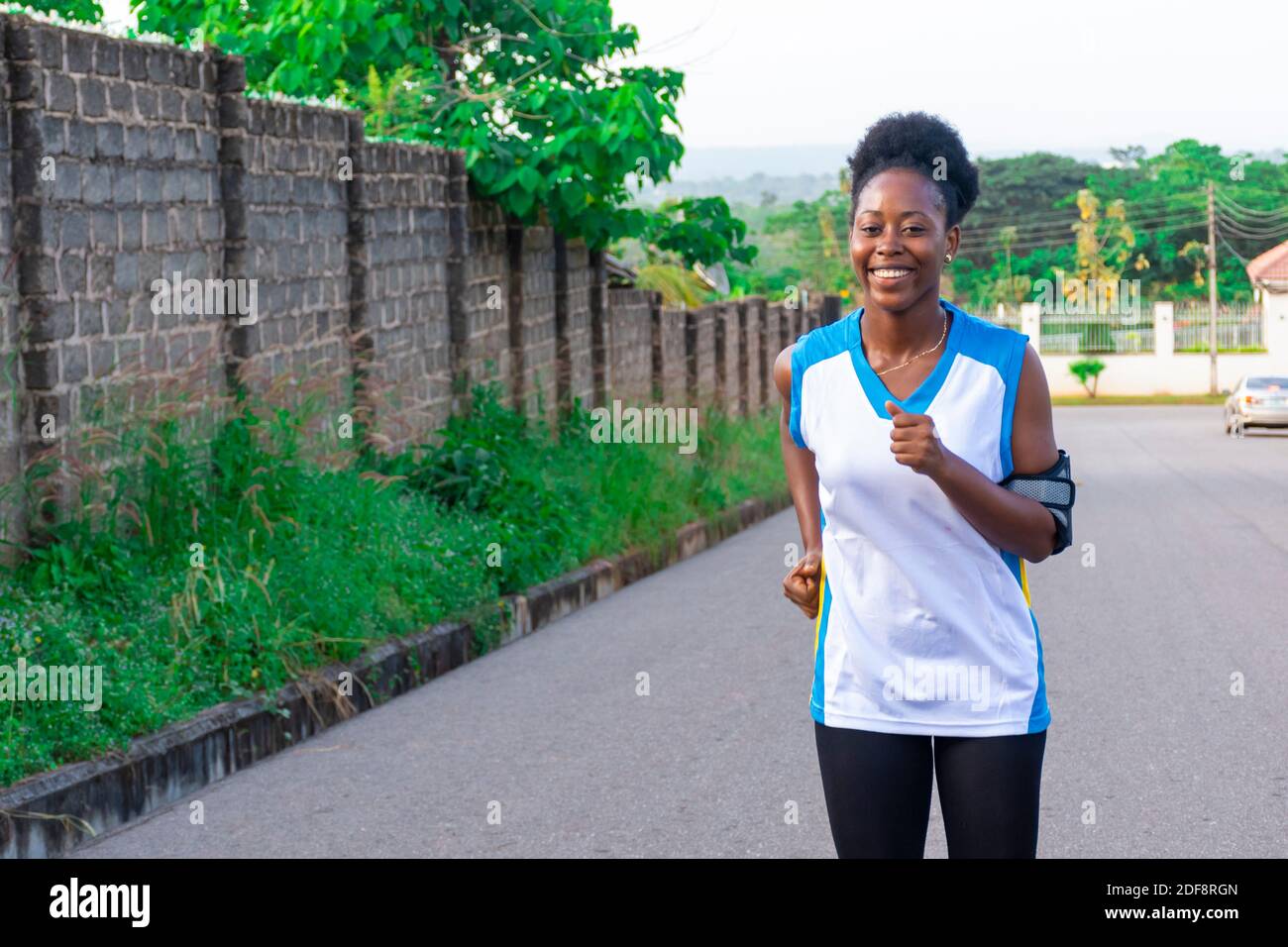 young african woman going for a run in the evening Stock Photo