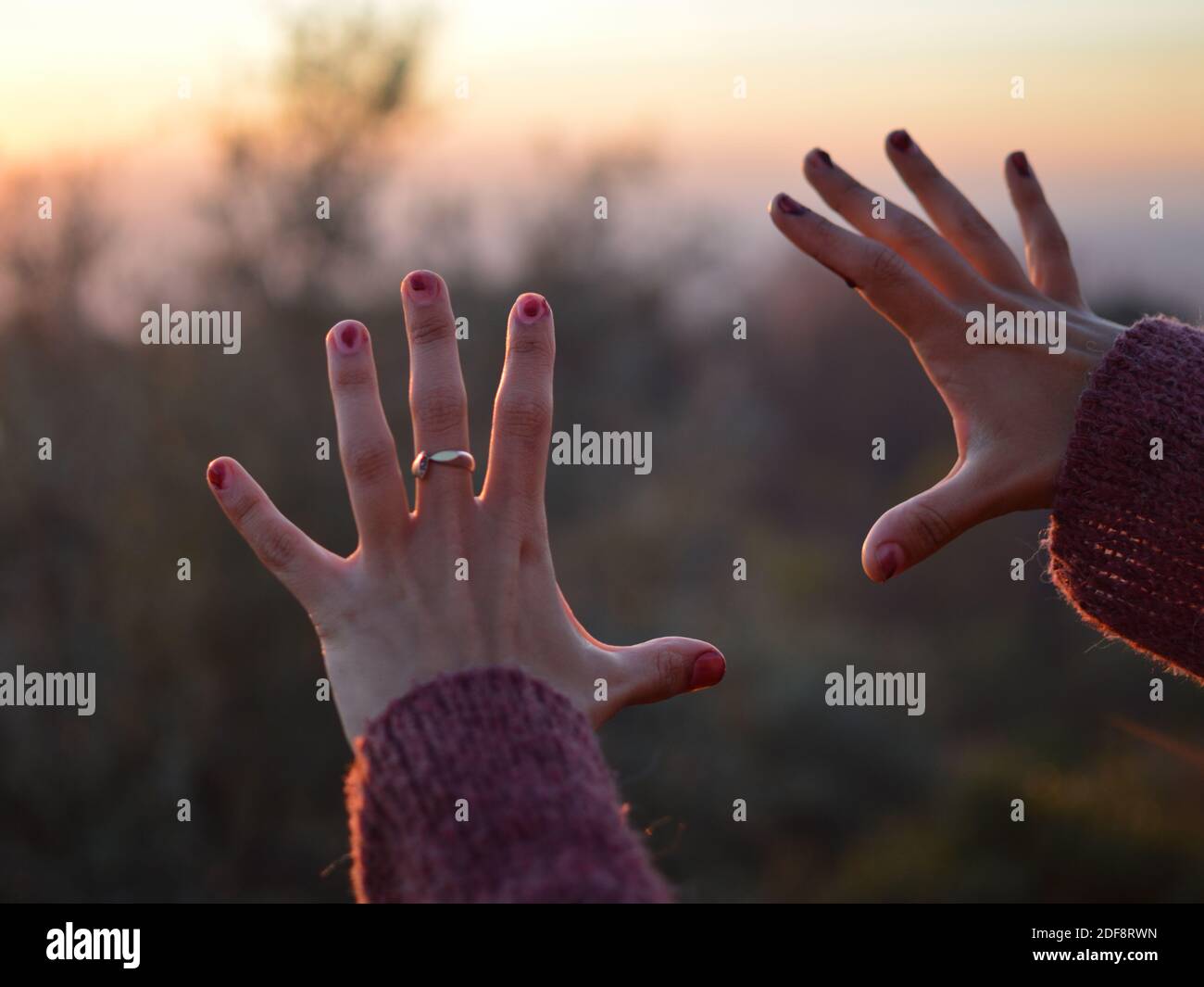 Nail Polish Flaking off of Nails, Hands during Sunset Stock Photo Alamy