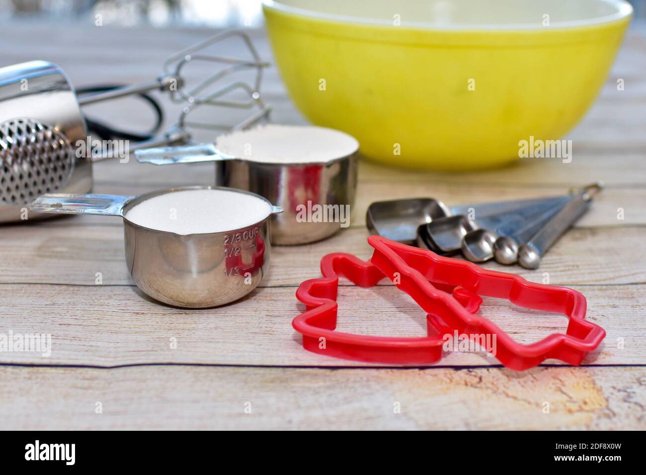 Holiday cookie kitchen utensils and bowls ready for seasonal baking