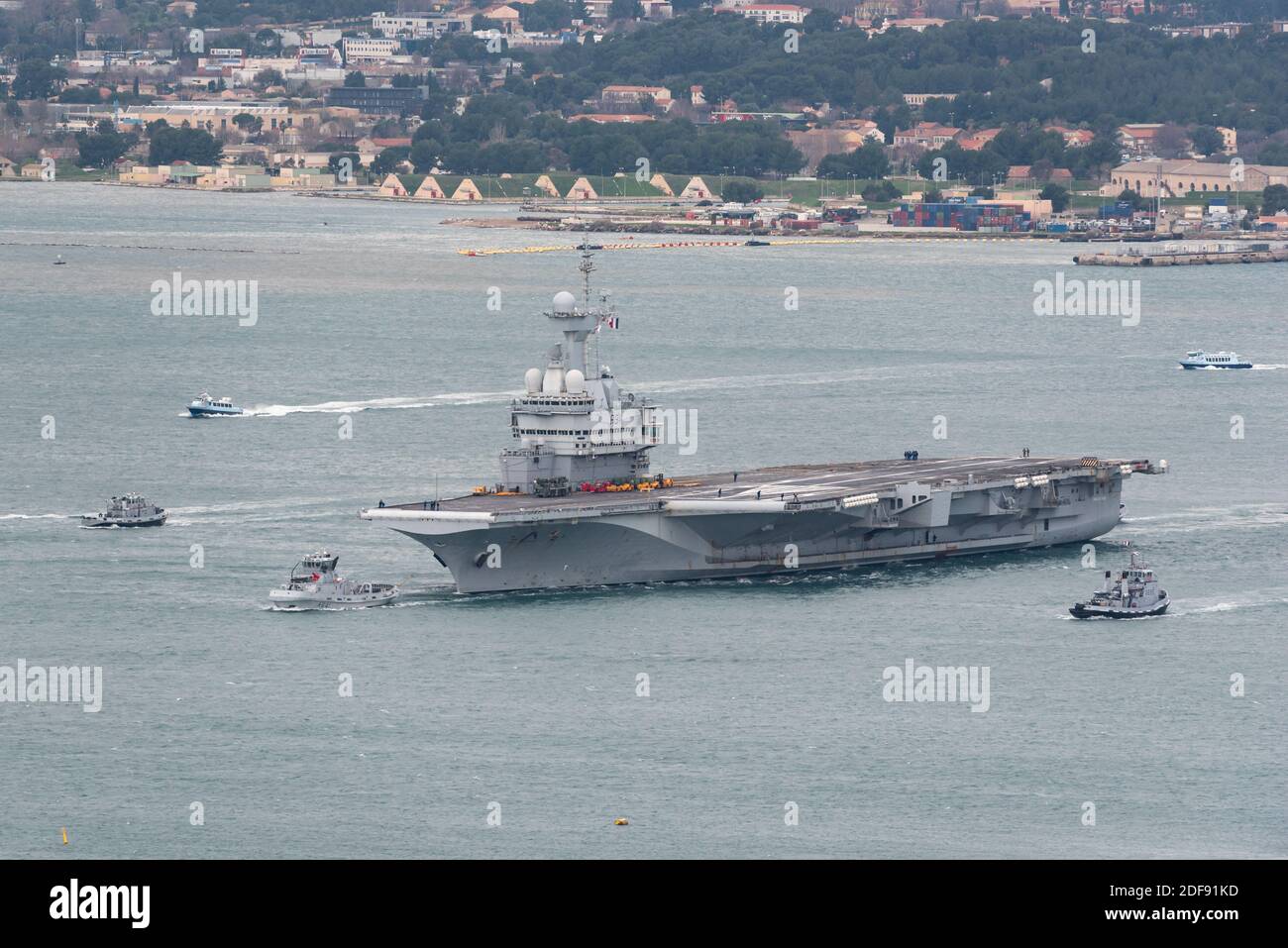 Hand out file photo dated January 21, 2020 of French nuclear aircraft carrier sets sail from Toulon naval base for a several months mission to the eastern Mediterranean to fight terrorism. France’s flagship military aircraft carrier the Charles de Gaulle is on its way back to port after some staff on board showed signs of Covid-19 symptoms, said the French armed forces ministry on Wednesday. The ministry said around 40 staff were under strict medical observation at present. The disclosure comes after a coronavirus outbreak hit the US aircraft carrier Theodore Roosevelt, now at port in Guam. Ph Stock Photo