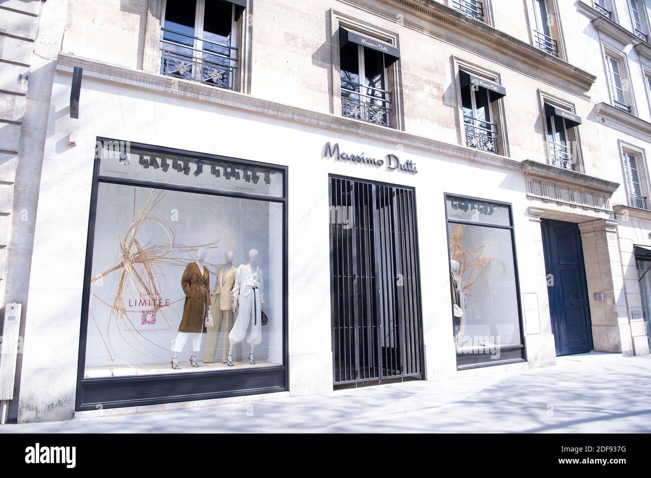 View of a closed Massimo Dutti store on the Royale street after  government's measures aimed at curbing the spread of the COVID-19  infection, caused by the novel coronavirus in Paris, on April
