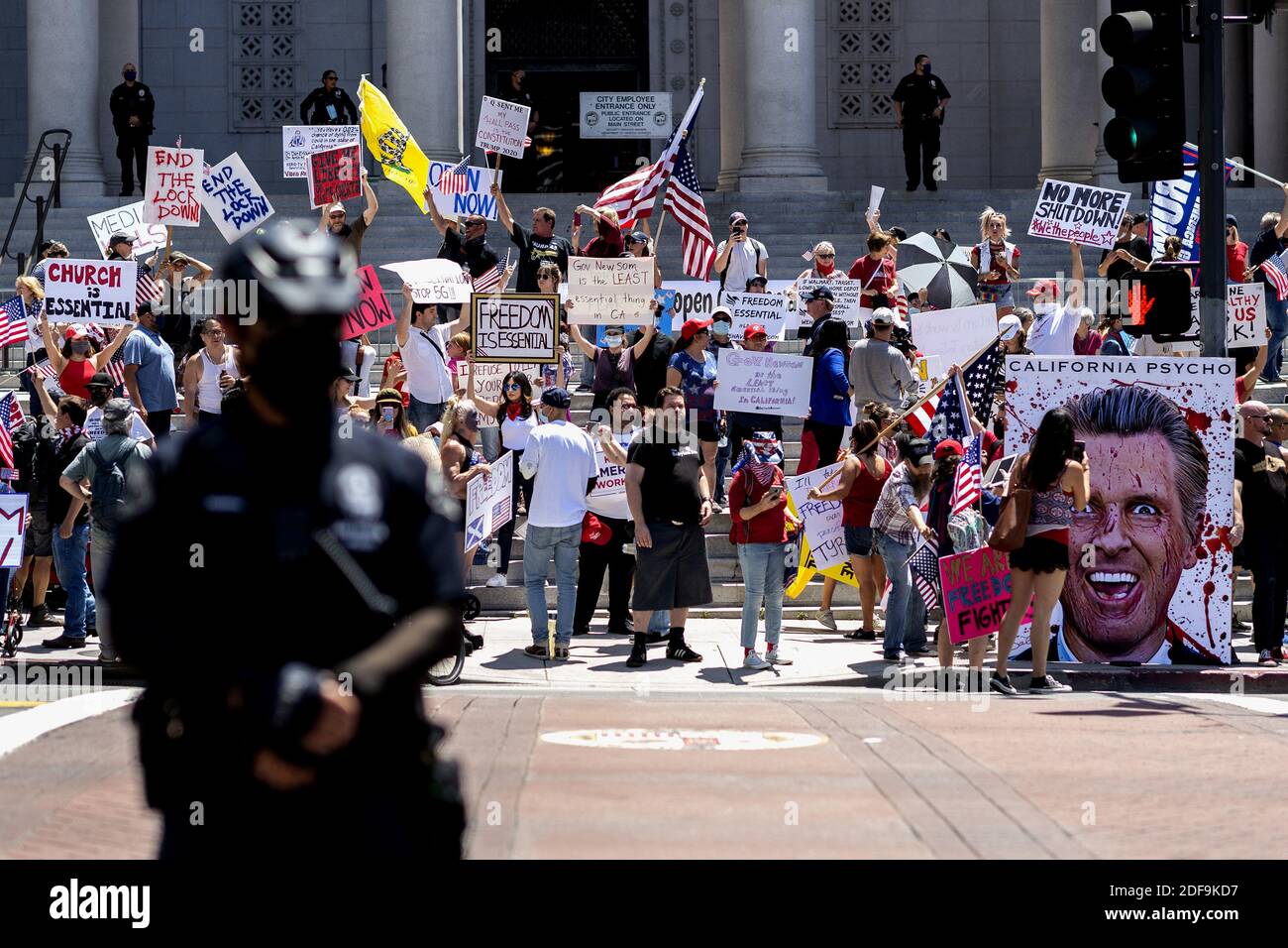 Demonstrators protest in front of the Los Angeles City Hall to demand ...