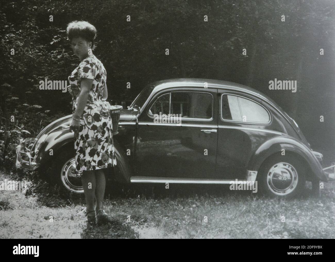 Historical Photo:  A woman with a VW Kaefer car  1964 in Biessenhofen, Bavaria, Germany. Reproduction in Marktoberdorf, Germany, October 26, 2020.  © Peter Schatz / Alamy Stock Photos Stock Photo