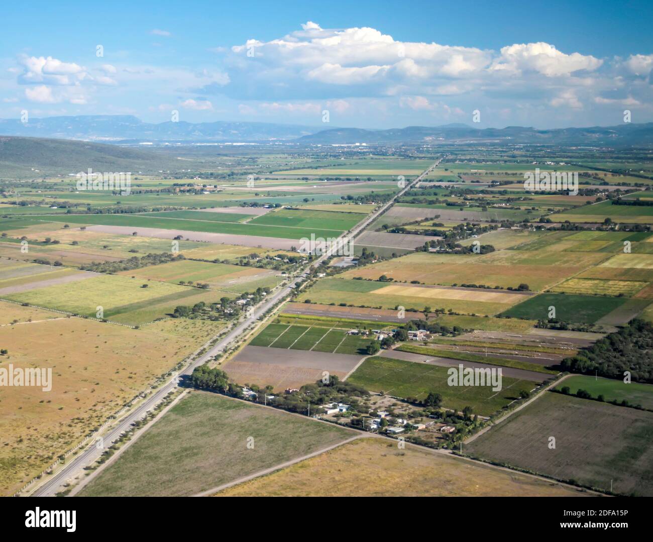 Railway line cuts through central Mexico landscape Stock Photo