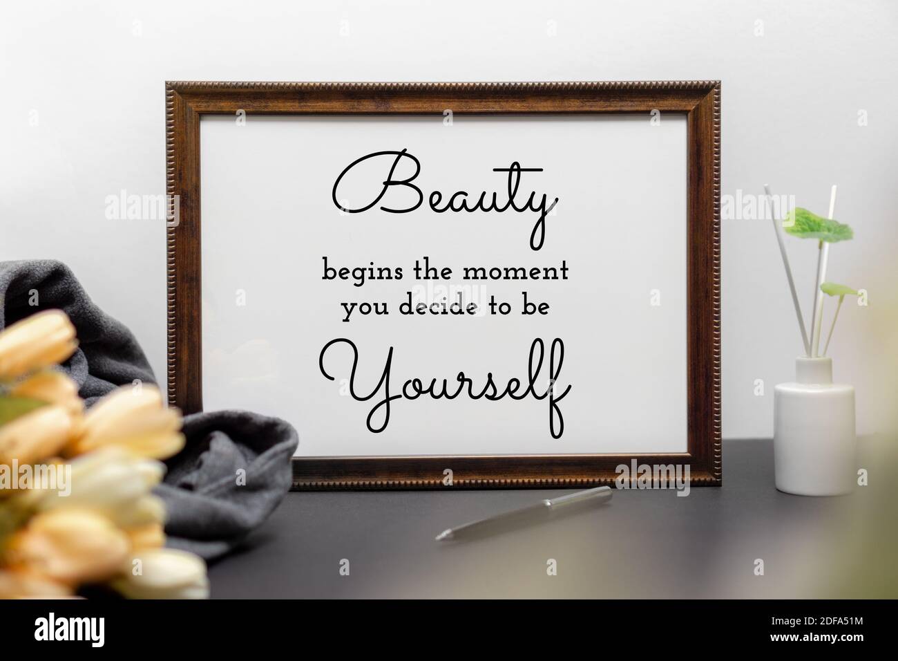 Inspirational and motivation beauty and life quote on wood frame - Beauty  Begins the Moment You Decide to be Yourself Stock Photo - Alamy, image size:1300x956