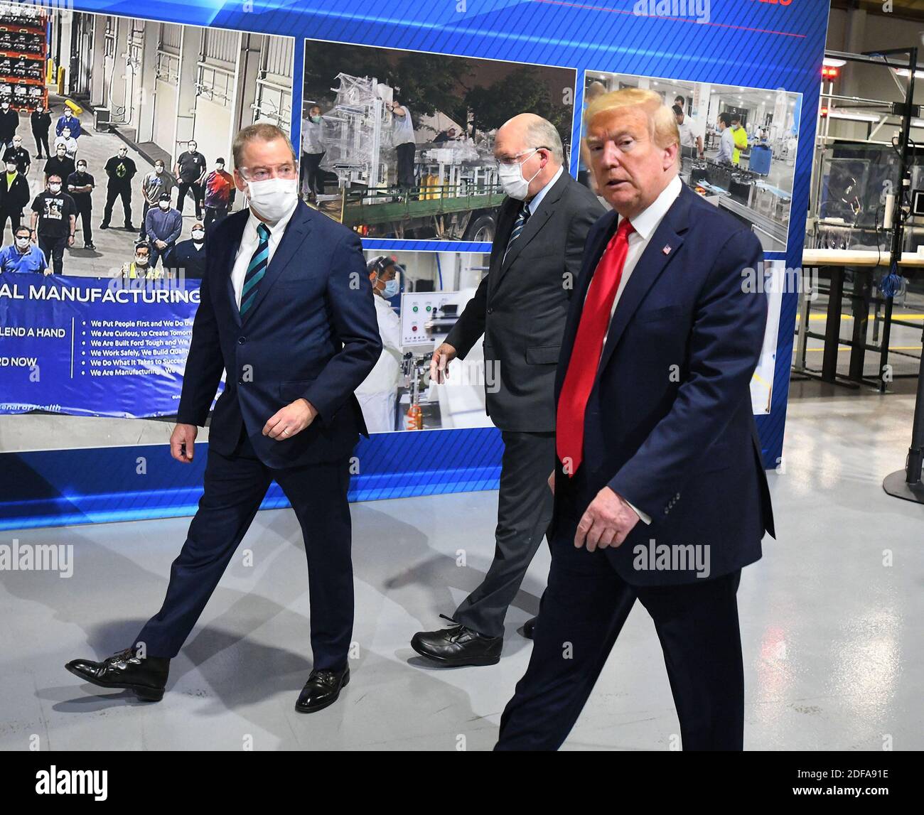 NO FILM, NO VIDEO, NO TV, NO DOCUMENTARY - President Donald Trump, right, and Executive Chairman of Ford Motor Company Bill Ford Jr., left, while touring Ford Motor Co.'s Rawsonville Components Plant in Ypsilanti, MI, USA on Thursday, May 21, 2020. Trump says he wore a mask in a 'back area' during a factory tour in Michigan, but removed it before facing the cameras. He told reporters he took off the facial covering at the Ford car plant because he 'didn't want to give the press the pleasure of seeing it', and he was about to make a speech. Photo by Daniel Mears/The Detroit News/TNS/ABACAPRESS. Stock Photo